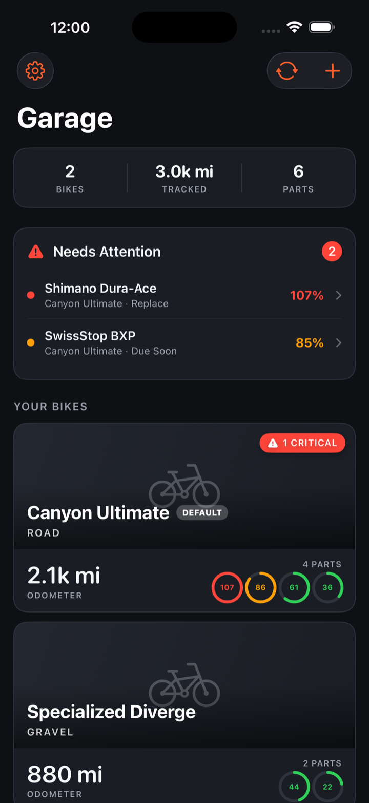 Drivetrain garage screen showing two bikes with color-coded component wear